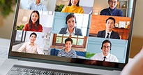 Young woman on a laptop in a Zoom meeting